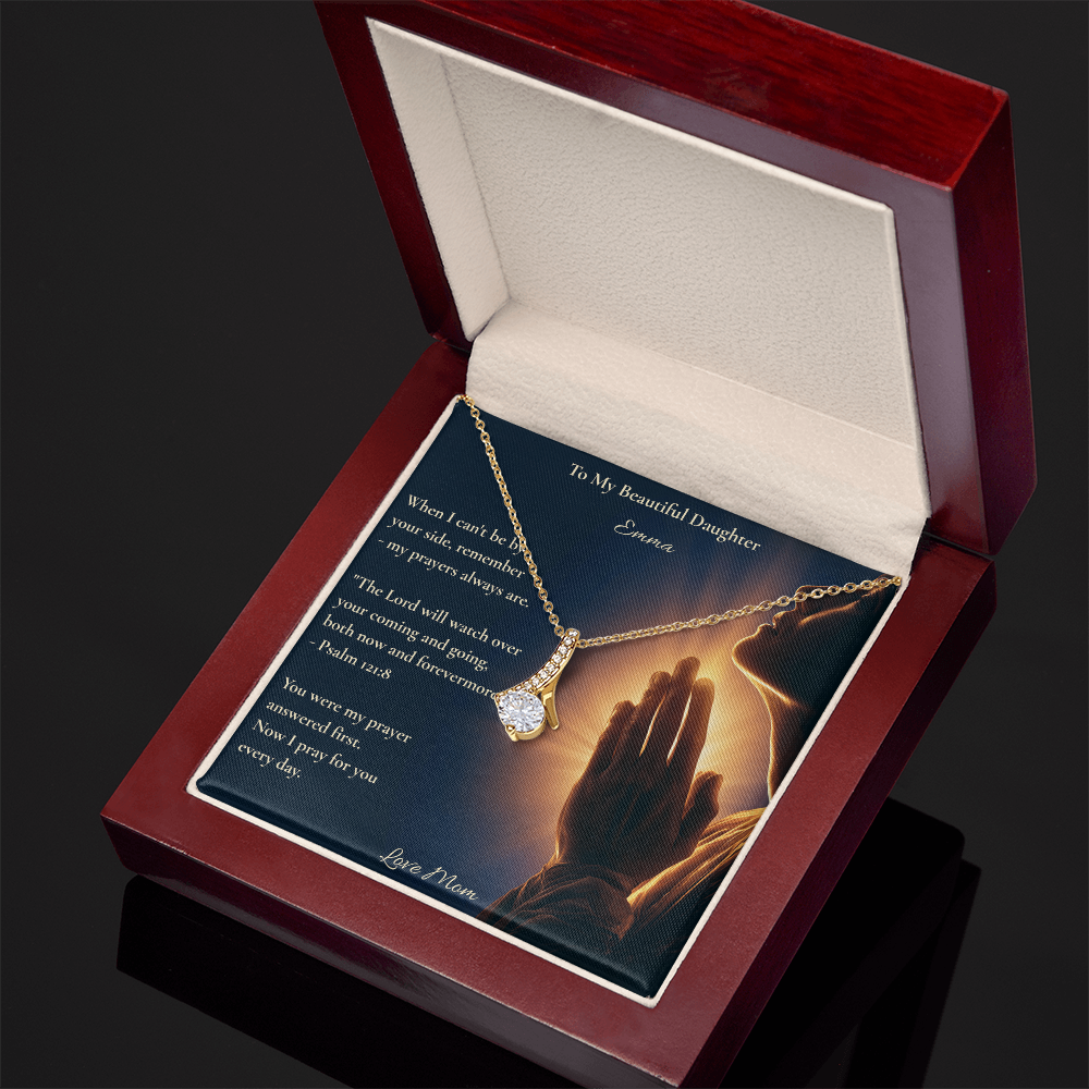 White gold necklace and To My Beautiful Daughter card in an open red luxury box, dark background
