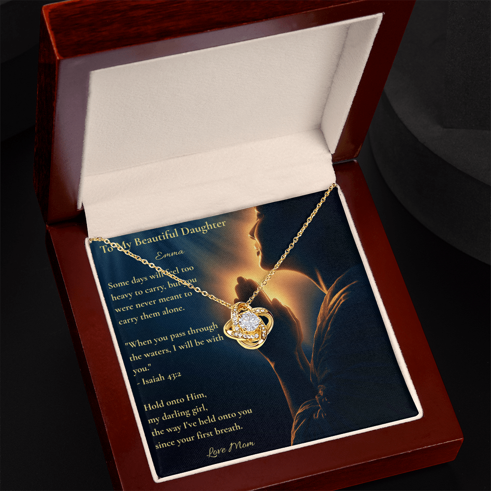Gold Love Knot necklace and personalized Isaiah 43:2 daughter card in an open mahogany box