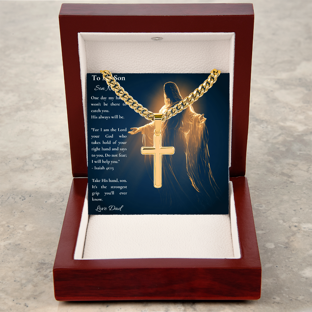 Silver cross pendant and personalized son card in an open mahogany gift box, angled view