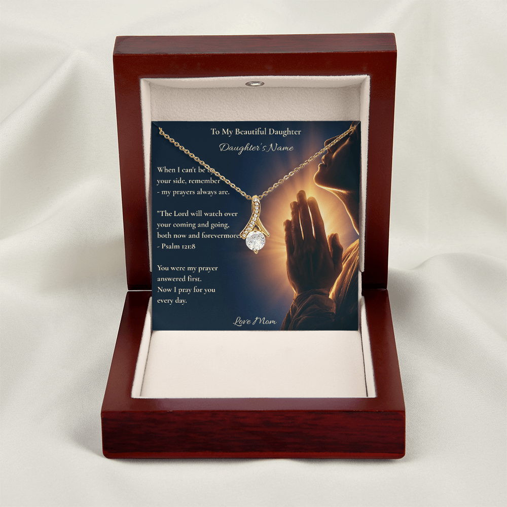 Silver ribbon necklace and personalised daughter card in a mahogany box on white fabric