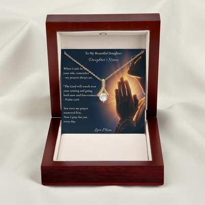 Silver ribbon necklace and personalised daughter card in a mahogany box on white fabric