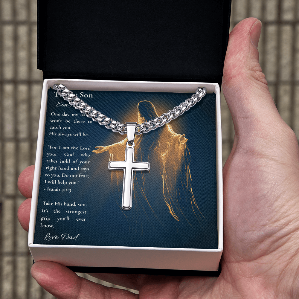 Hand holding a Cuban link cross necklace and To My Son card in a gift box