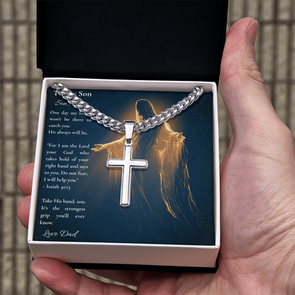 Hand holding a Cuban link cross necklace and To My Son card in a gift box
