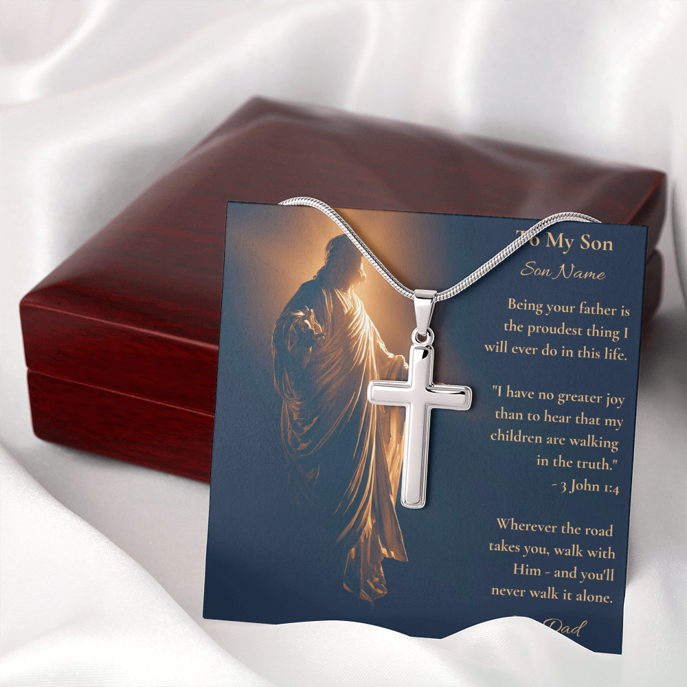 Stainless steel cross necklace and To My Son message card beside a mahogany box