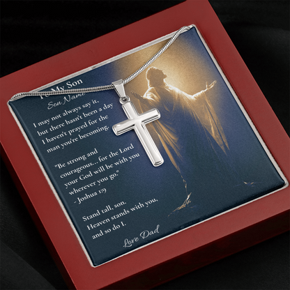 Silver cross necklace and personalised son card in a red luxury gift box, angled view