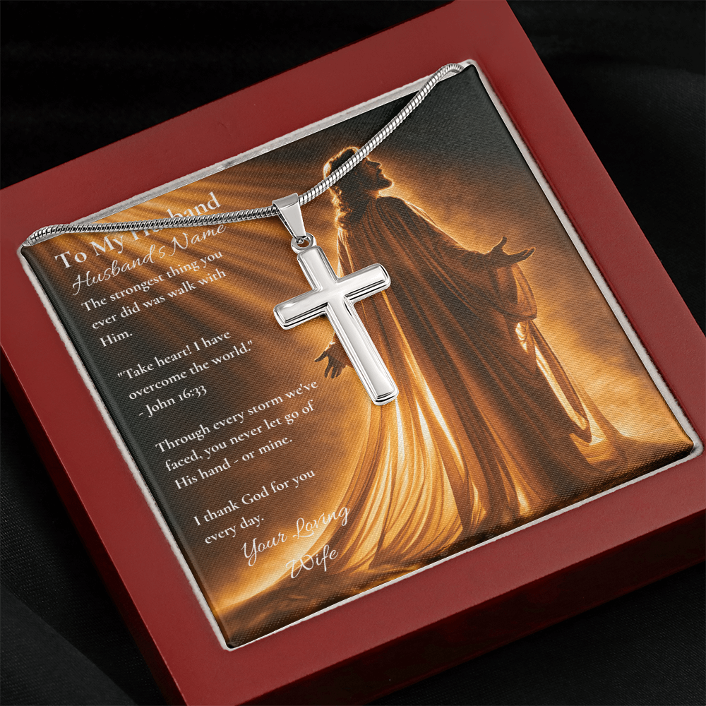 Silver cross necklace and personalized husband card in a red gift box, angled view