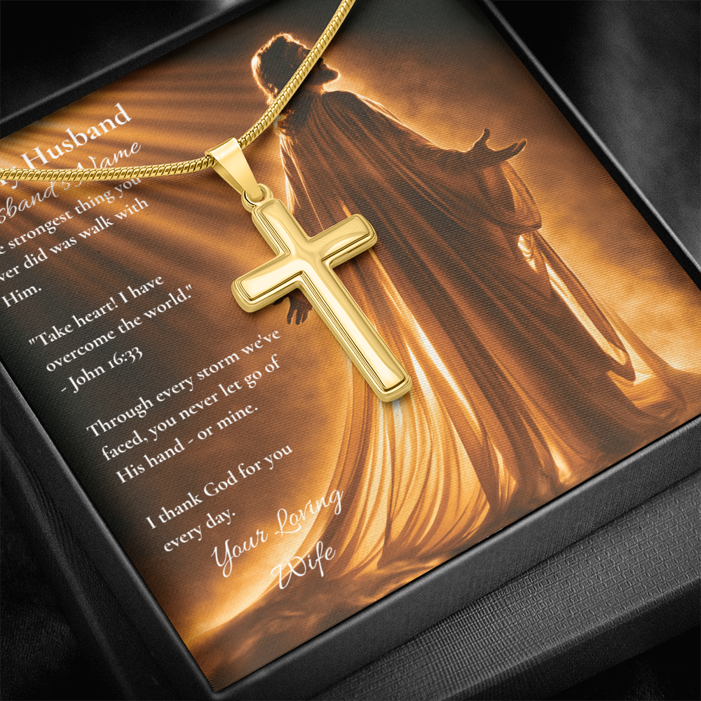 Yellow gold cross pendant on a To My Husband card with John 16:33, warm background